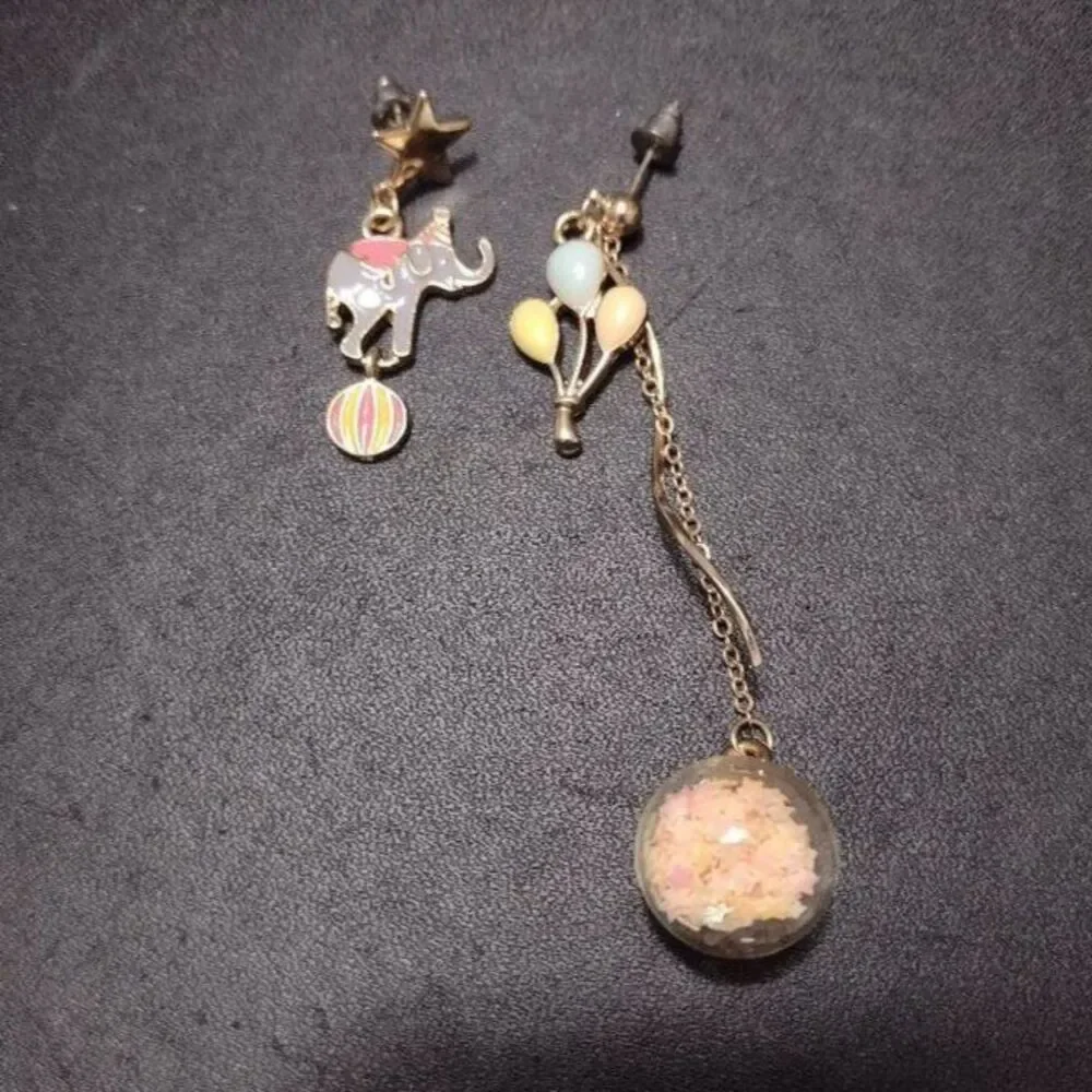 Circus high low earrings